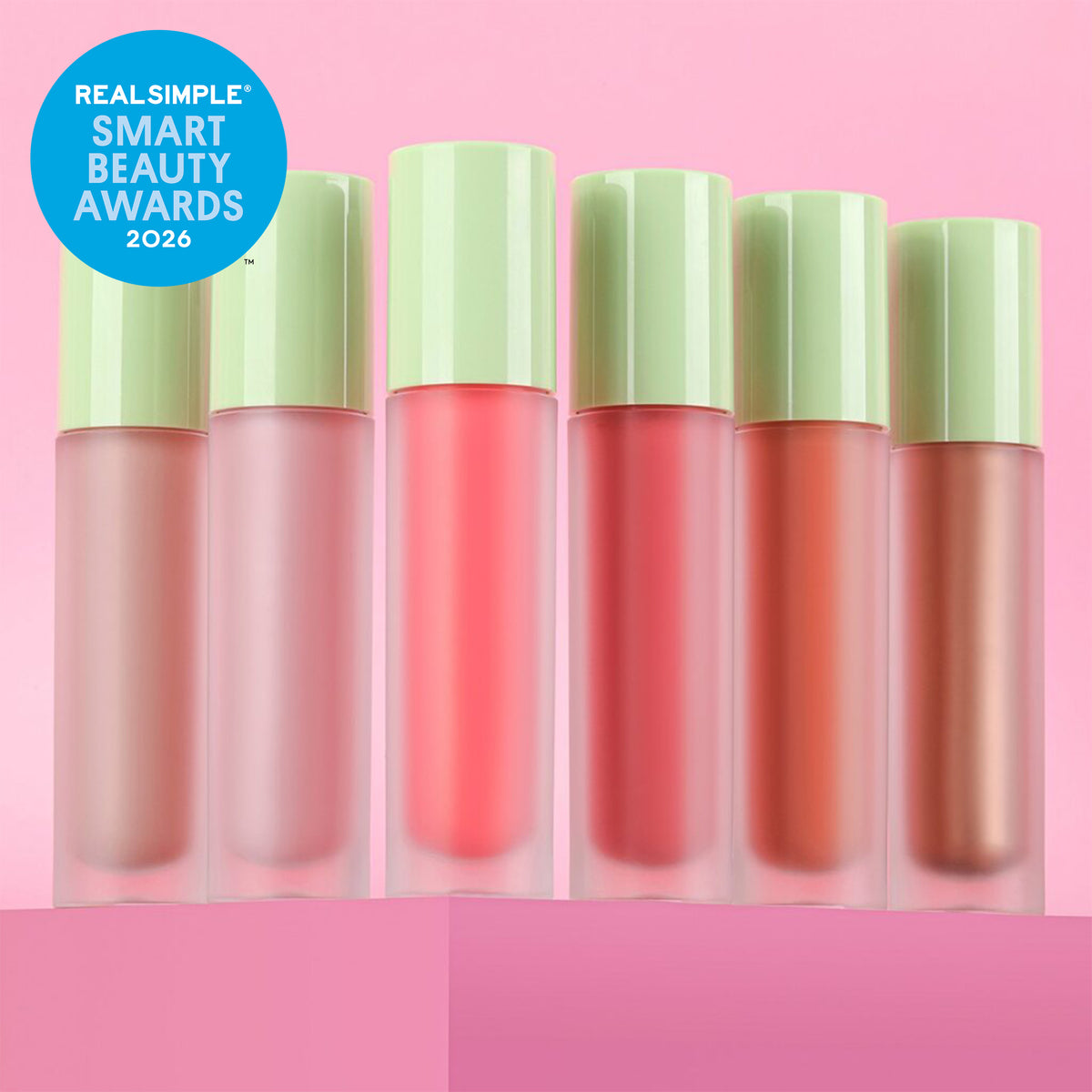 All shades of LiquidGlow Blush shown on a pink background with RealSimple Smart Beauty Awards 2026 sticker -