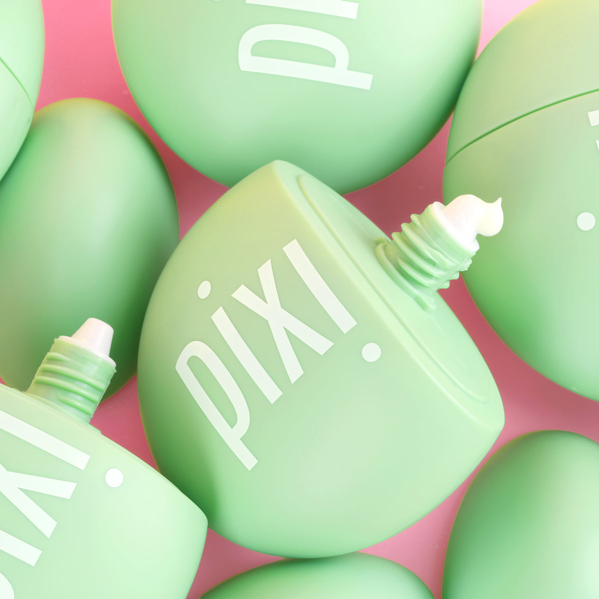 Green Pixi HandHero with 'PIXI' branding on a pink background