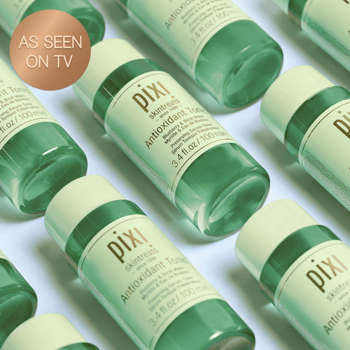 As Seen On TV: Multiple bottles Antioxidant Tonic shown on a green background view 1