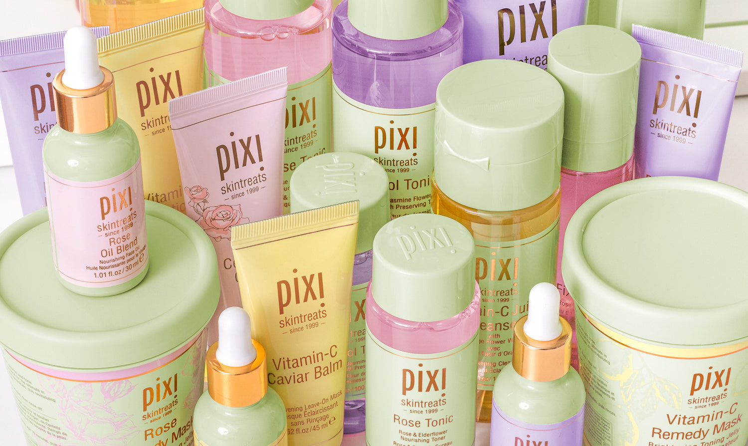 Collection of Pixi skincare products on a white background