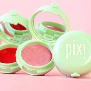 pixi beauty lipmask with open cases on a pink background